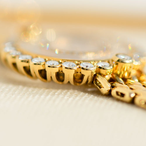 Montre Chopard Happy Diamonds - Montre femme en or jaune 18k et diamants 58 Facettes 3292