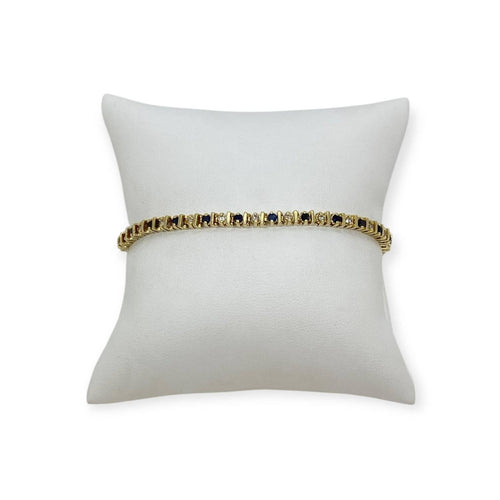 Bracelet Bracelet ligne en or jaune 14K serti de saphirs et diamants 58 Facettes 330092350