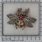 Broche Broche abeille de l'entre-deux-guerres avec diamants et rubis en or et argent 58 Facettes 26050-0263