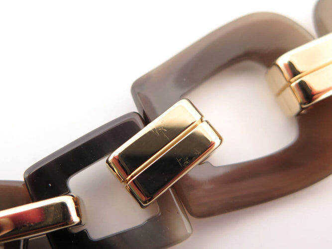 Bracelet Hermès Écuyère - Bracelet en corne et métal doré 58 Facettes 273708
