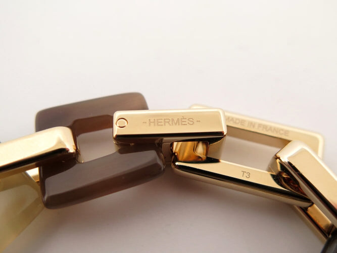 Bracelet Hermès Écuyère - Bracelet en corne et métal doré 58 Facettes 273708