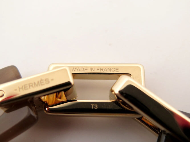 Bracelet Hermès Écuyère - Bracelet en corne et métal doré 58 Facettes 273708