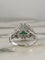 Bague 53 Bague en or blanc et jaune 18K avec émeraude et diamants 58 Facettes 243