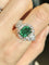 Bague 53 Bague en or blanc et jaune 18K avec émeraude et diamants 58 Facettes 243
