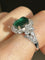 Bague 53 Bague en or blanc et jaune 18K avec émeraude et diamants 58 Facettes 243