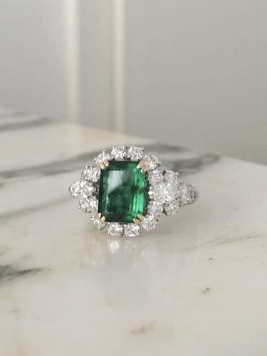 Bague 53 Bague en or blanc et jaune 18K avec émeraude et diamants 58 Facettes 243