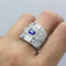Bague 54 Bague bandeau Art déco en or blanc 750 avec diamants et saphir 58 Facettes 250369R
