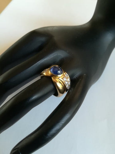 Bague 49 Bague jonc croisée en or jaune avec saphir et diamants 58 Facettes 01350