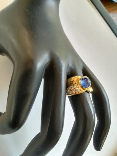 Bague 49 Bague jonc croisée en or jaune avec saphir et diamants 58 Facettes 01350
