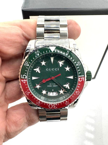 Montre Gucci Dive - Montre homme Plongée 136.2 à quartz 58 Facettes 260035