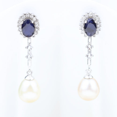 Montre Pendientes convertibles en or blanc 18K avec saphirs, diamants et perle 58 Facettes 138512