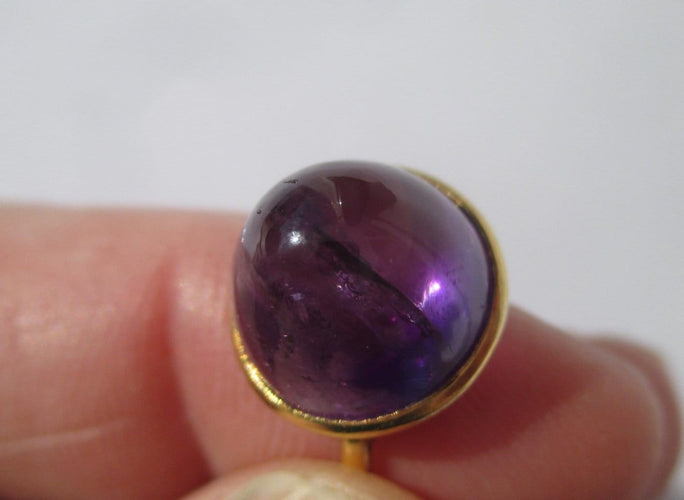 Bague 54 Bague en or jaune et améthyste pain de sucre 7 ct, circa 1910 58 Facettes Bague