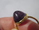 Bague 54 Bague en or jaune et améthyste pain de sucre 7 ct, circa 1910 58 Facettes Bague