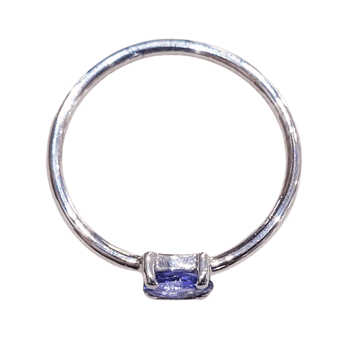 Bague 50 Bague en or blanc 18k et tanzanite ovale fantaisie 0,35 ct 58 Facettes TA250