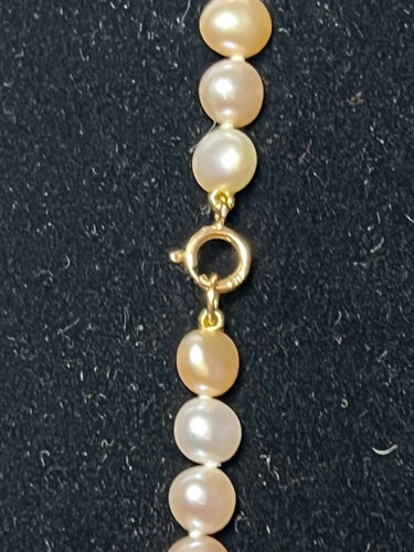 Collier Collier 77 perles de culture d’eau douce 45 cm en or jaune 750 58 Facettes 857
