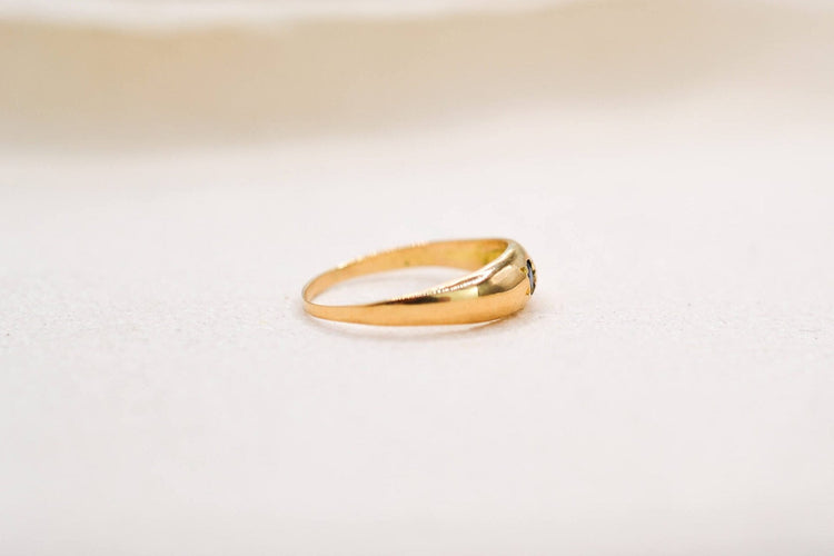 Bague jonc sertie d’un saphir étoilé en or jaune 18 carats 58 Facettes 3892