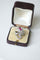 Bague 61 Arabesque - Bague en or blanc rubis birman et diamants 58 Facettes