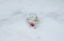 Bague 61 Arabesque - Bague en or blanc rubis birman et diamants 58 Facettes