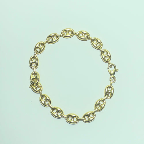 Bracelet Bracelet graine de café - Gourmette en or jaune 18 carats 58 Facettes 260104