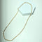 Collier Collier graine de café en or 18 carats (750/1000) 58 Facettes 260106
