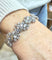 Bracelet Bracelet en or blanc 18 carats et platine serti de diamants naturels 58 Facettes orplat