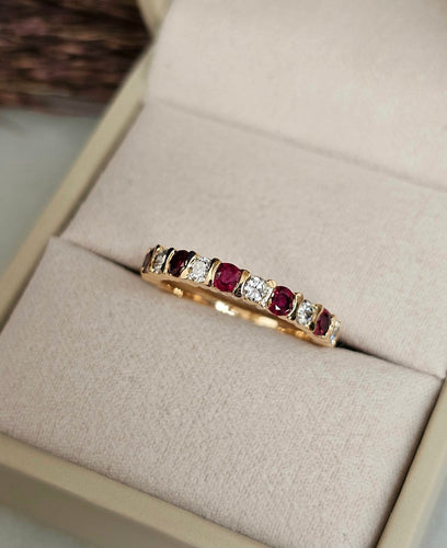 Bague 47 Bague demi-alliance rubis et diamants en or rose 18 carats 58 Facettes 697
