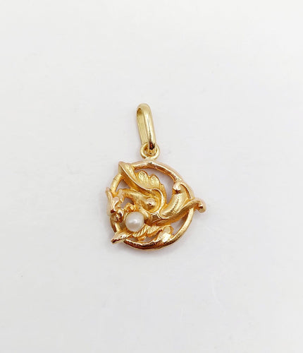 Pendentif Pendentif antique chimère ou griffon ailé en or rose 18k avec perle 58 Facettes A06776