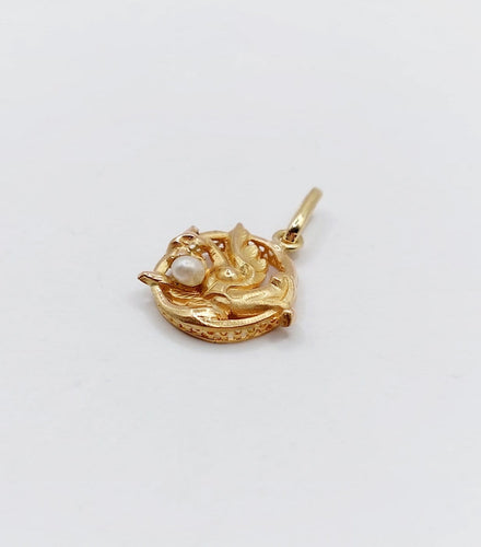 Pendentif Pendentif antique chimère ou griffon ailé en or rose 18k avec perle 58 Facettes A06776