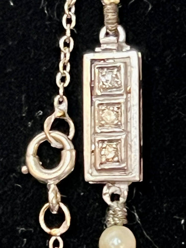 Collier Collier Art déco en chute de perles de culture, fermoir en or gris 18K et diamants 58 Facettes 000