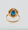 Bague 54 Bague - Topaze bleue et émeraudes en or rose 58 Facettes