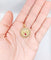 Pendentif Pendentif médaille d’amour en or rose 18k, rubis synthétique 58 Facettes A06908