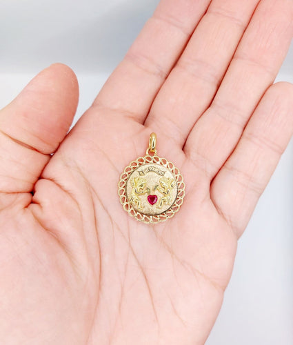 Pendentif Pendentif médaille d’amour en or rose 18k, rubis synthétique 58 Facettes A06908