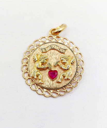 Pendentif Pendentif médaille d’amour en or rose 18k, rubis synthétique 58 Facettes A06908