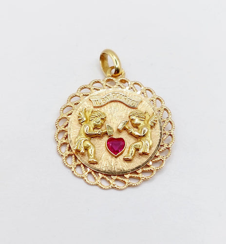 Pendentif Pendentif médaille d’amour en or rose 18k, rubis synthétique 58 Facettes A06908