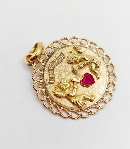 Pendentif Pendentif médaille d’amour en or rose 18k, rubis synthétique 58 Facettes A06908