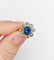 Bague 48 Bague marguerite antique en or blanc 18k et platine, saphir et diamants 58 Facettes A06876