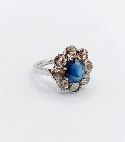 Bague 48 Bague marguerite antique en or blanc 18k et platine, saphir et diamants 58 Facettes A06876