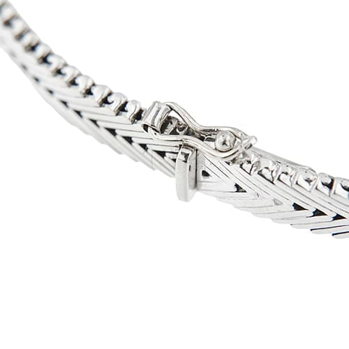 Bracelet Bracelet en or blanc 18 ct avec émeraudes et diamants 58 Facettes 41153