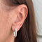 Boucles d'oreilles Boucles d'oreilles créoles ovales en or blanc 18 ct avec diamants 58 Facettes 37200