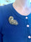 Broche Broche rétro volute en or jaune 18 carats et diamants 58 Facettes BRO67