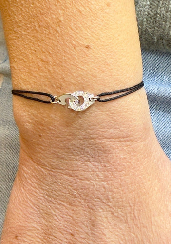Bracelet Dinh Van Menottes - Bracelet sur cordon XS en or blanc et diamants 58 Facettes Dv