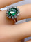 Bague 46 Bague marguerite en or blanc 18 carats, émeraude et diamants 58 Facettes AB693