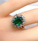 Bague 46 Bague marguerite en or blanc 18 carats, émeraude et diamants 58 Facettes AB693