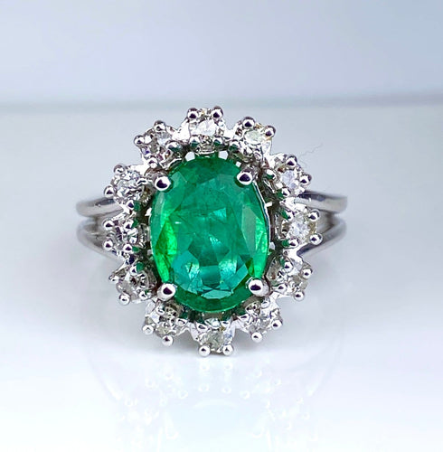 Bague 46 Bague marguerite en or blanc 18 carats, émeraude et diamants 58 Facettes AB693