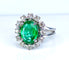 Bague 46 Bague marguerite en or blanc 18 carats, émeraude et diamants 58 Facettes AB693