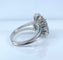 Bague 46 Bague marguerite en or blanc 18 carats, émeraude et diamants 58 Facettes AB693