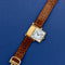 Montre Cartier Tank Réversible - Montre en or jaune, cadran « Paris » (réf. 2582) 58 Facettes 070