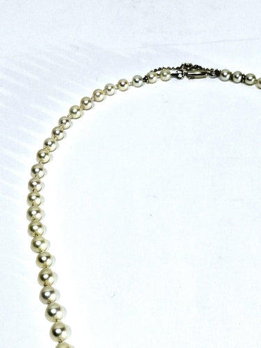 Collier Collier de perles avec fermoir en or blanc 18 carats 58 Facettes 1734922