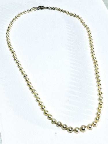 Collier Collier de perles avec fermoir en or blanc 18 carats 58 Facettes 1734922