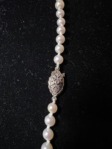 Collier Collier en chute de 71 perles de culture, fermoir en or 18K et diamant 58 Facettes 936